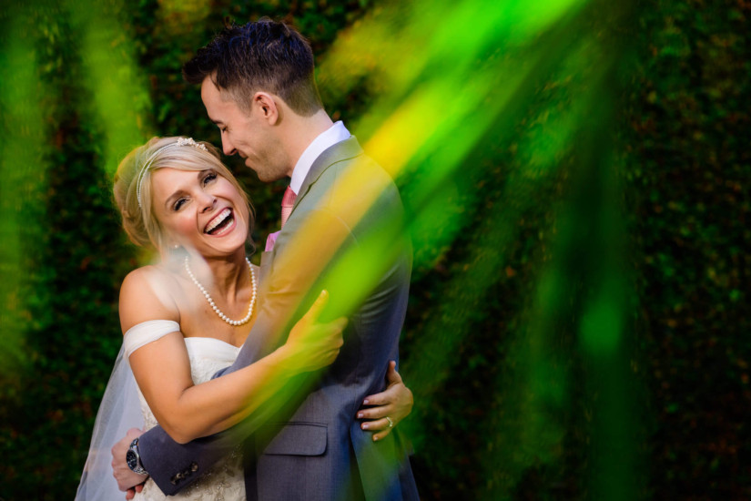 Bride and Groom have a loving embrace during wedding photo session at Westlake Village Inn