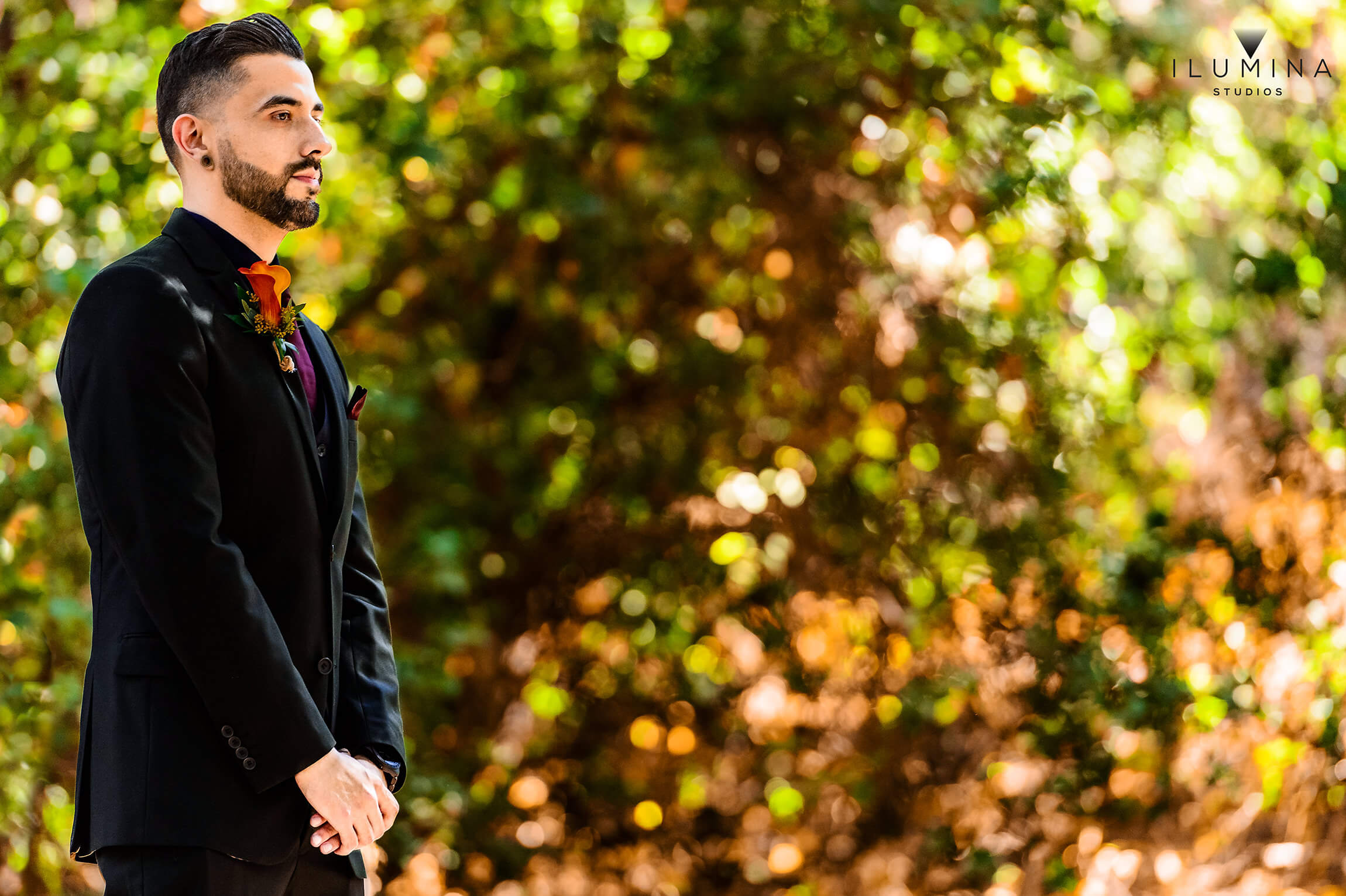 Color photograph of groom waiting for bride at the altar at Anaheim Oak Canyon Nature Center wedding