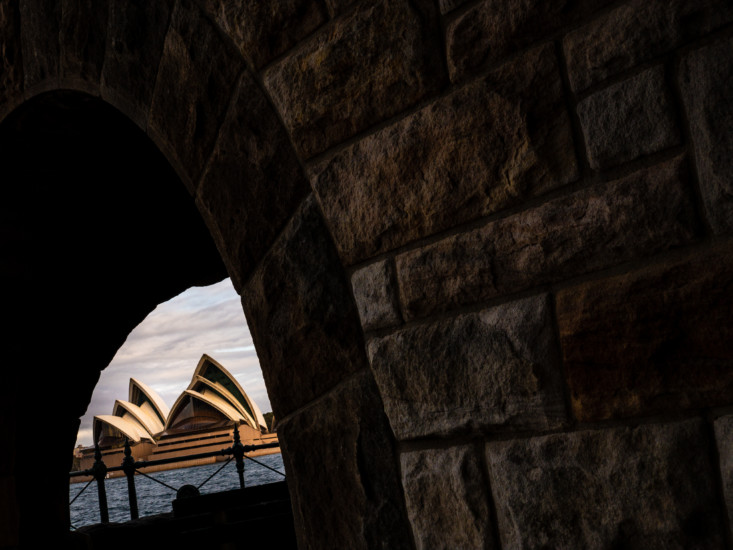 sydney opera house from under a bridge