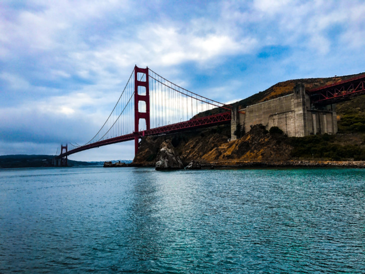 Photo of long red bridge over water